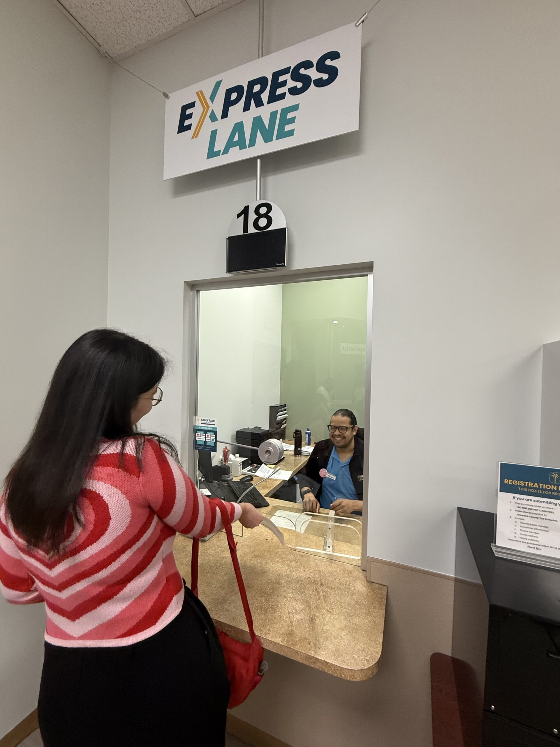 A lady using the express lane at our planation location.